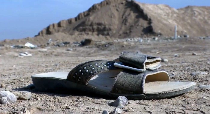 A shoe from a victim of mass executions at a dump yard near Hammam al-Alil, Iraq [11/11/2016] 